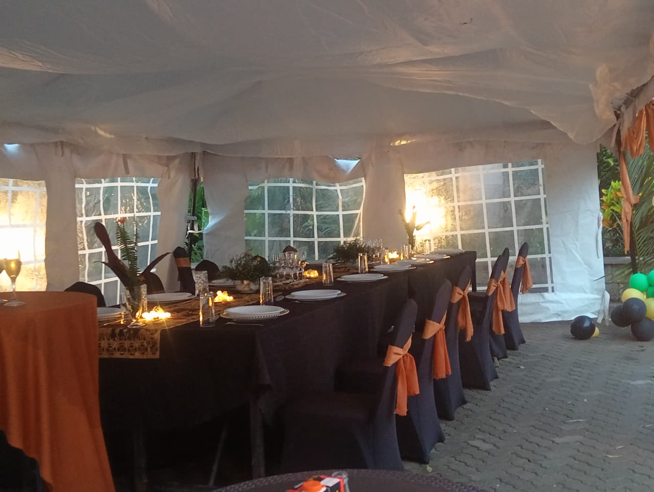Candle-lit private dinner set-up in the tent