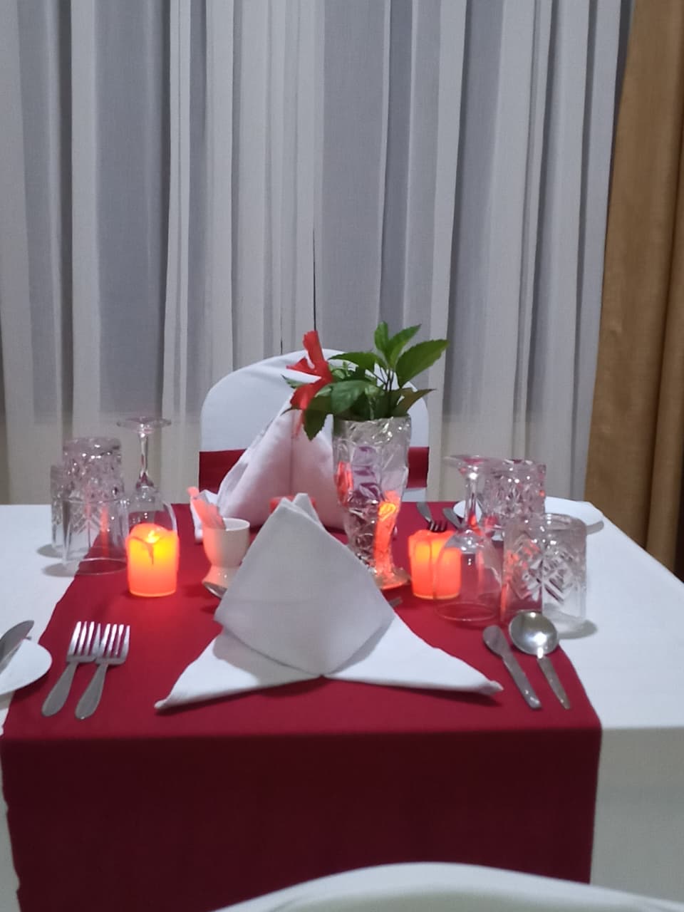 Set dinner table for two indoors
