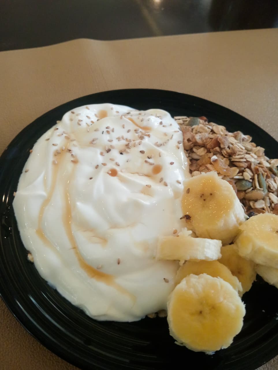 Greek yoghurt with granola and banana